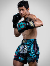SKS Muay Thai Shorts Sakyant “Stickerbomb” - Schwarz / Blau