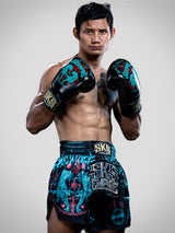 SKS Muay Thai Shorts Sakyant “Stickerbomb” - Schwarz / Blau